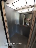 Envelopamento de Porta e Cabine de Elevador