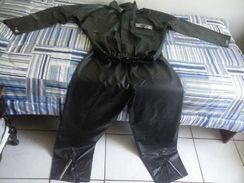 Roupa de Chuva Alba