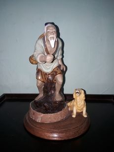 Estatueta Pescador e o Cão