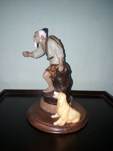 Estatueta Pescador e o Cão
