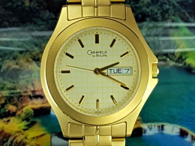 Relógio Caravelle Bulova 43c68 Dourado, Semana e Dia